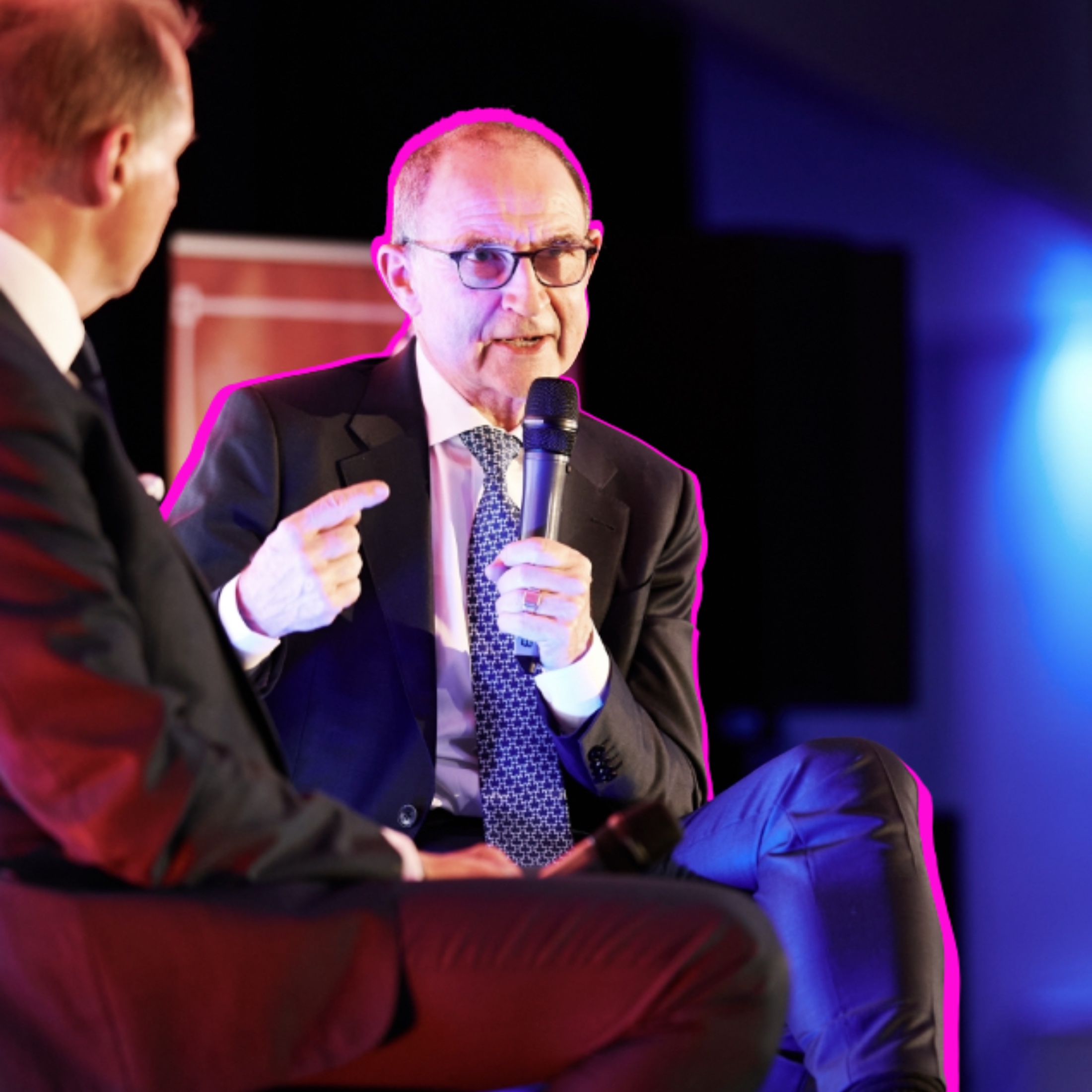 Guest speaker in conversation on stage at an event