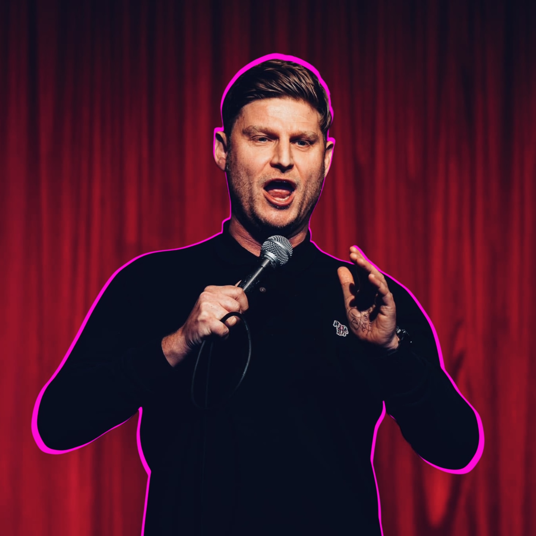 Speaker engaging an audience with a microphone on stage